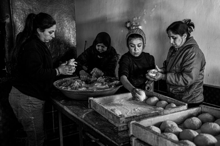 26:QUAMISHLI,SYRIA, Residents of the community can be seen working at their own bakery which provides bread to evceryone who lives there. The community lies some 60km from the Syrian Kurdish capital of Rojava and was setup in 2017